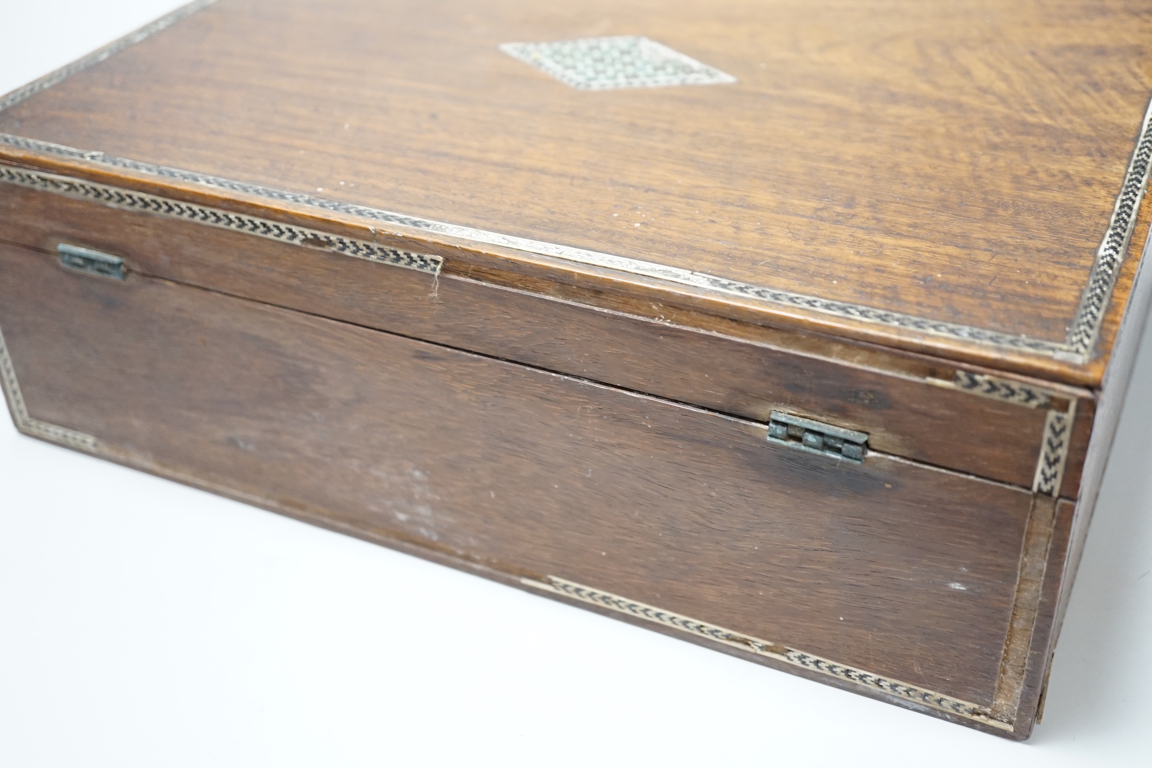 A Damascus jewellery casket, 30.5cm wide, 10cm high